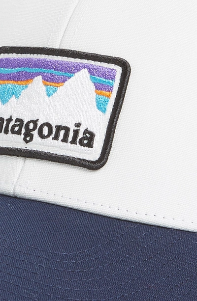 Shop Patagonia Shop Sticker Trucker Hat - White In White With Classic Navy