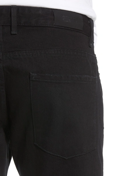 Shop Represent Relaxed Fit Frayed Jeans In Black