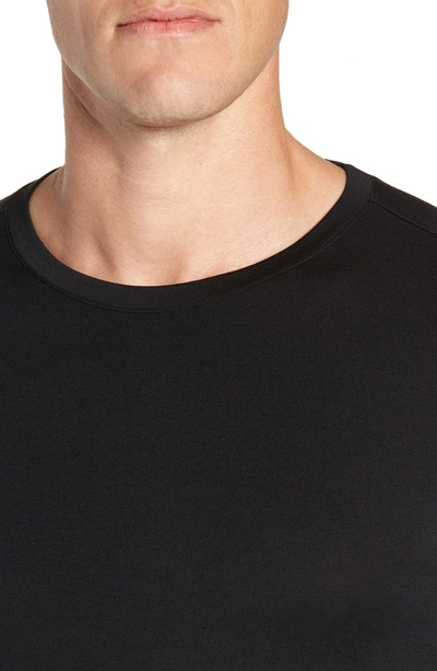 Shop Tommy John Sleek Heat Crewneck Long Sleeve T-shirt In Black
