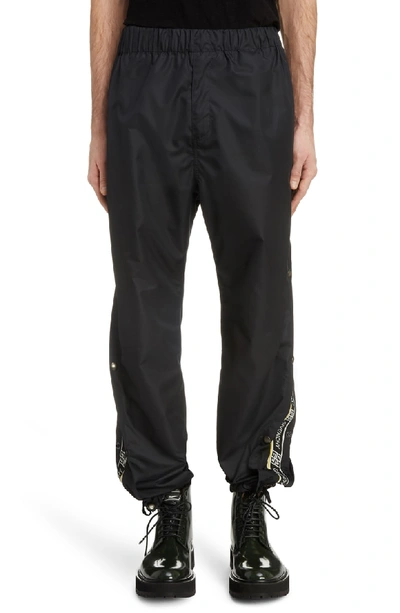 Shop Givenchy Snap Seam Logo Jogger Pants In Black