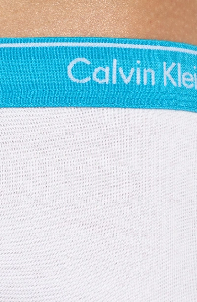 Shop Calvin Klein 4-pack Cotton Briefs In White W/ Blue/ Green/ Grey