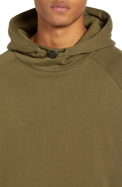 Shop Native Youth Patch Pocket Pullover Hoodie In Olive