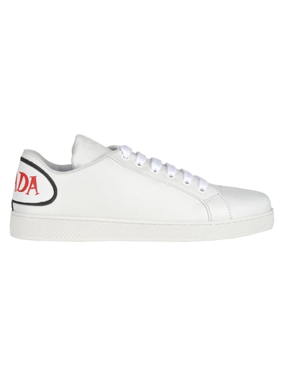 Shop Prada Comics Sneakers In White + White