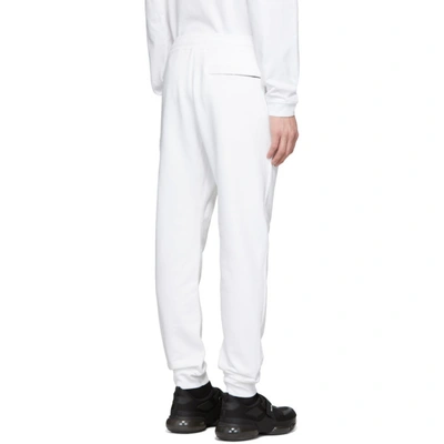 Shop Stone Island White Logo Badge Lounge Pants In V0001 White