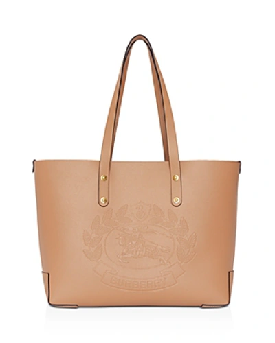 Shop Burberry Small Embossed Crest Leather Tote In Light Camel/gold
