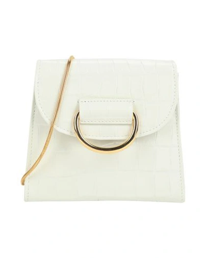 Shop Little Liffner Handbags In White