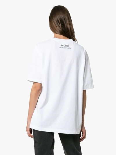 Shop Calvin Klein Jeans Est.1978 Calvin Klein Jeans Est. 1978 Logo Print Cotton T-shirt In 001 White