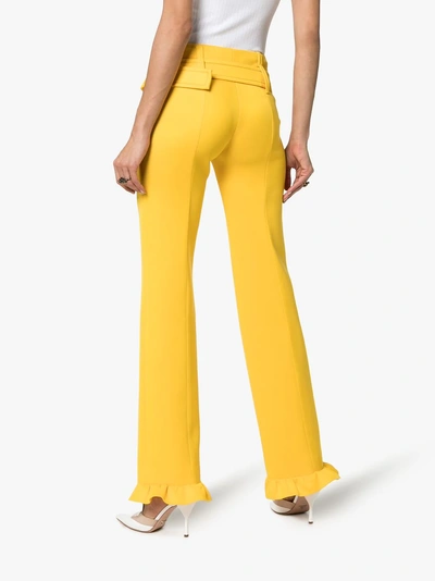 Shop Prada Belted Ruffle Hem Straight Trousers In Giallo