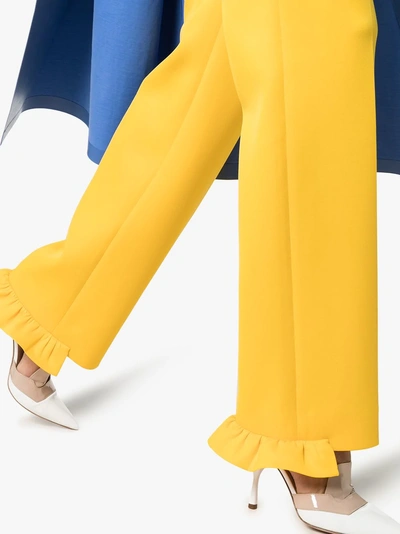 Shop Prada Belted Ruffle Hem Straight Trousers In Giallo