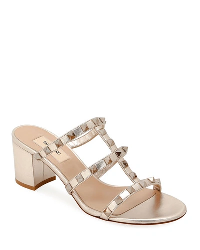 Shop Valentino Rockstud Caged Metallic Leather Slide Sandals In Skin