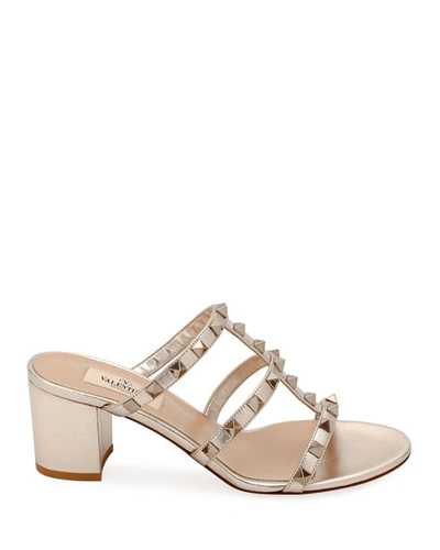 Shop Valentino Rockstud Caged Metallic Leather Slide Sandals In Skin