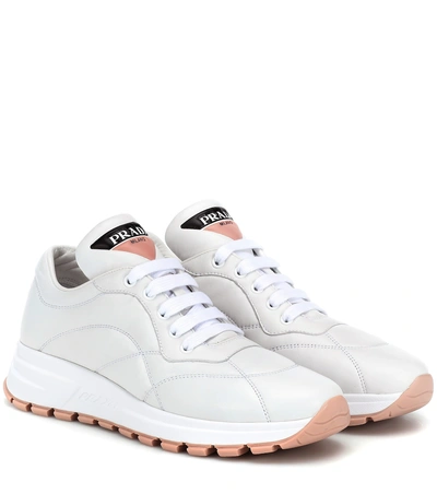 Shop Prada Prax-01 Leather Sneakers In White