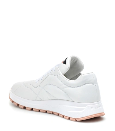 Shop Prada Prax-01 Leather Sneakers In White