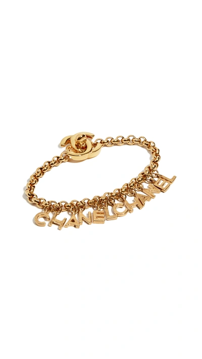 Shop Chanel Letters Charm Bracelet In Gold
