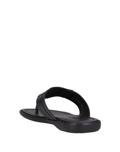 Shop Doucal's Flip Flops In Black