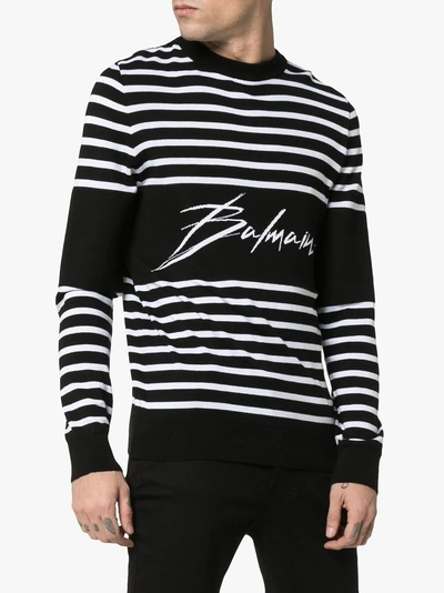 Shop Balmain Gestreifter Pullover Mit Logo In Gab Black/white