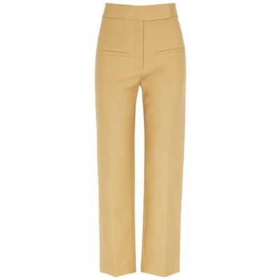 Shop Khaite Coco Sand Cropped Cotton Trousers In Beige