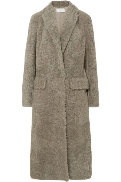Shop The Row Muto Belted Shearling Coat In Gray