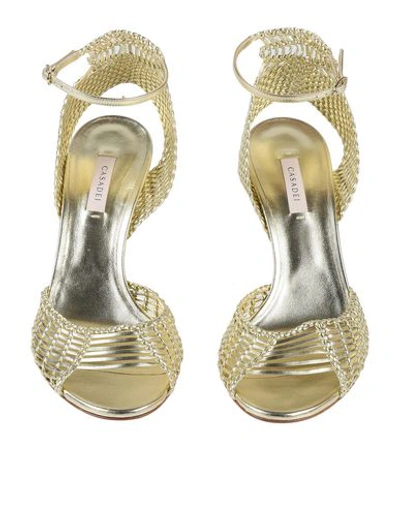 Shop Casadei Sandals In Gold