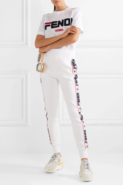 Shop Fendi Appliquéd Cotton-blend Jersey Track Pants In White