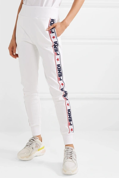 Shop Fendi Appliquéd Cotton-blend Jersey Track Pants In White