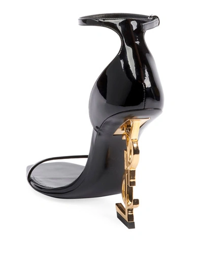 Shop Saint Laurent Opyum Ysl Logo-heel Sandals With Golden Hardware In Black