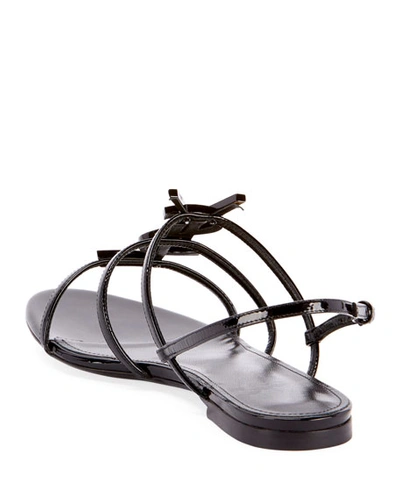Shop Saint Laurent Cassandre Ysl Logo Flat Patent Sandals In Black