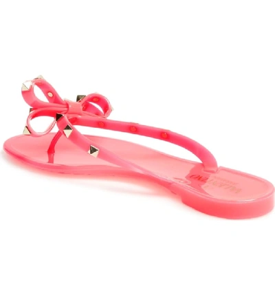 Shop Valentino Rockstud Jelly Thong In Pink