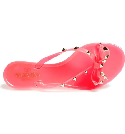 Shop Valentino Rockstud Jelly Thong In Pink