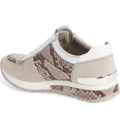 Shop Michael Michael Kors Allie Wrap Trainer Sneakers In Pearl Grey