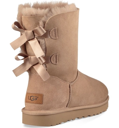 Shop Ugg Bailey Bow Ii Genuine Shearling Boot In Fawn