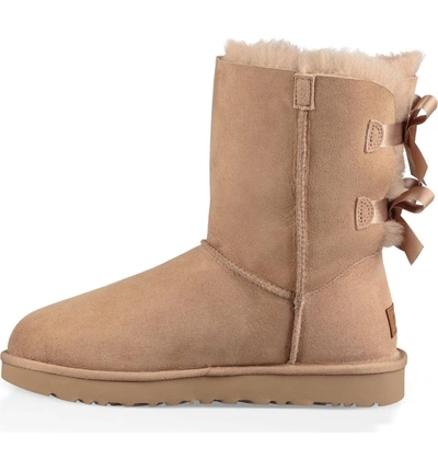 Shop Ugg Bailey Bow Ii Genuine Shearling Boot In Fawn