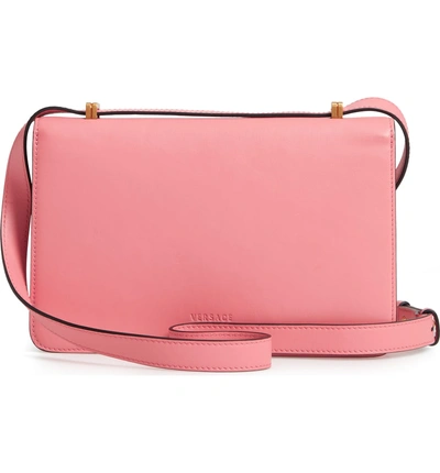 Shop Versace Tribute Embossed Leather Crossbody Bag - Pink In Shell Pink/ Tribute Gold