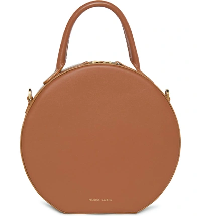 Shop Mansur Gavriel Calfskin Leather Circle Crossbody Bag In Saddle