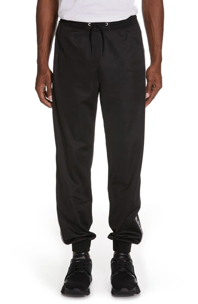 Shop Givenchy Logo Stripe Track Pants In Black