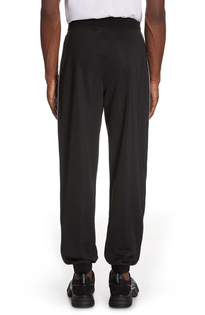 Shop Givenchy Logo Stripe Track Pants In Black