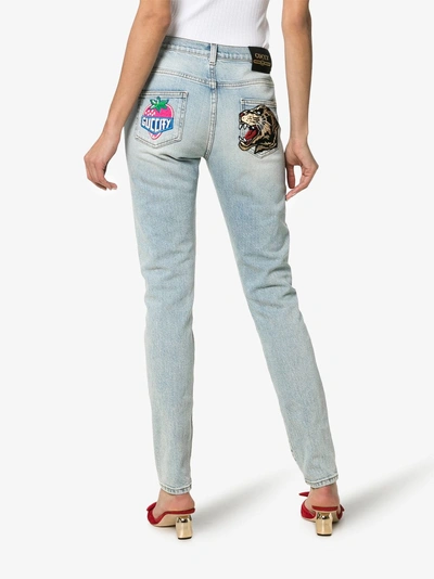 Shop Gucci Embroidered Strawberry Leopard Skinny Jeans In 4493 Blue