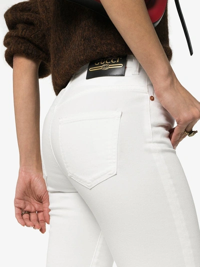 Shop Gucci High Waist Logo Patch Skinny Jeans In 9200 White