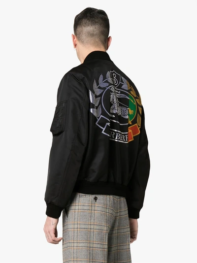 Shop Burberry Crest Print Bomber Jacket In A5377 Black