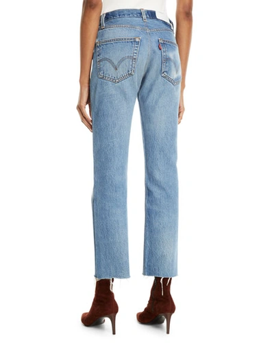 Shop Re/done High-rise Whiskered Stovepipe Jeans With Raw-edge Hem In Indigo