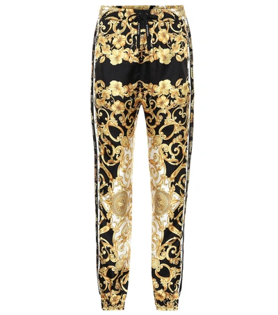 Shop Versace Printed Silk Twill Trackpants In Black