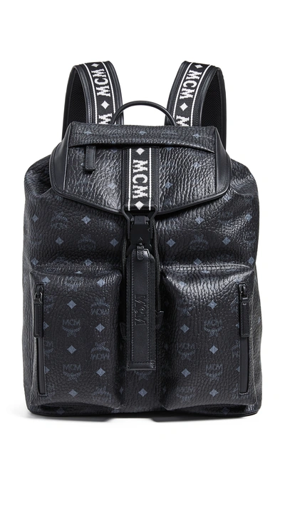 Shop Mcm Raymonde Two Pocket Medium Backpack In Black
