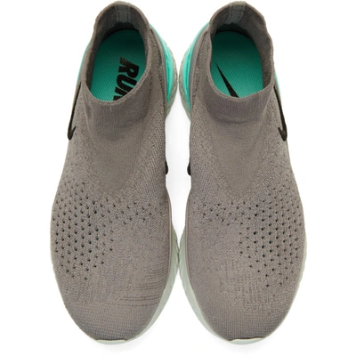 Shop Nike Grey Flyknit Rise React Sneakers In 002gnsmkblk