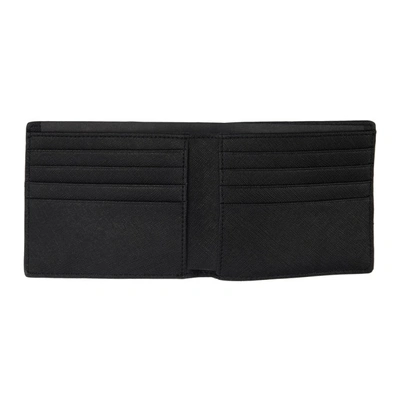 Shop Mcq By Alexander Mcqueen Mcq Alexander Mcqueen Black Metal Logo Fold Wallet In 1000 Dk.blk