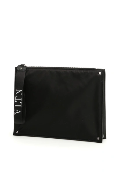 Shop Valentino Vltn Clutch In Nero Bianco|nero