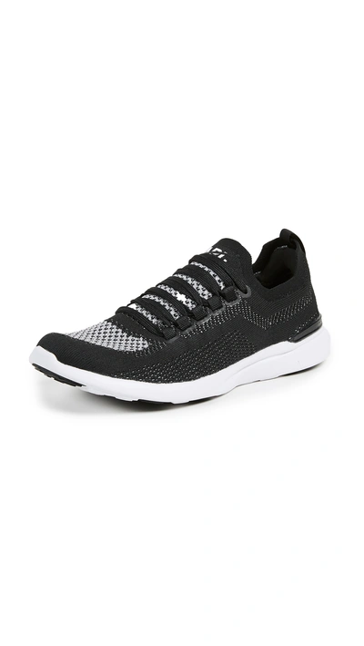 Shop Apl Athletic Propulsion Labs Techloom Breeze Sneakers In Black/metallic Silver/white