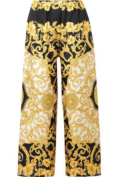 Shop Versace Printed Cropped Silk-charmeuse Wide-leg Pants In Yellow
