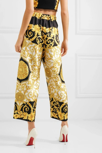 Shop Versace Printed Cropped Silk-charmeuse Wide-leg Pants In Yellow