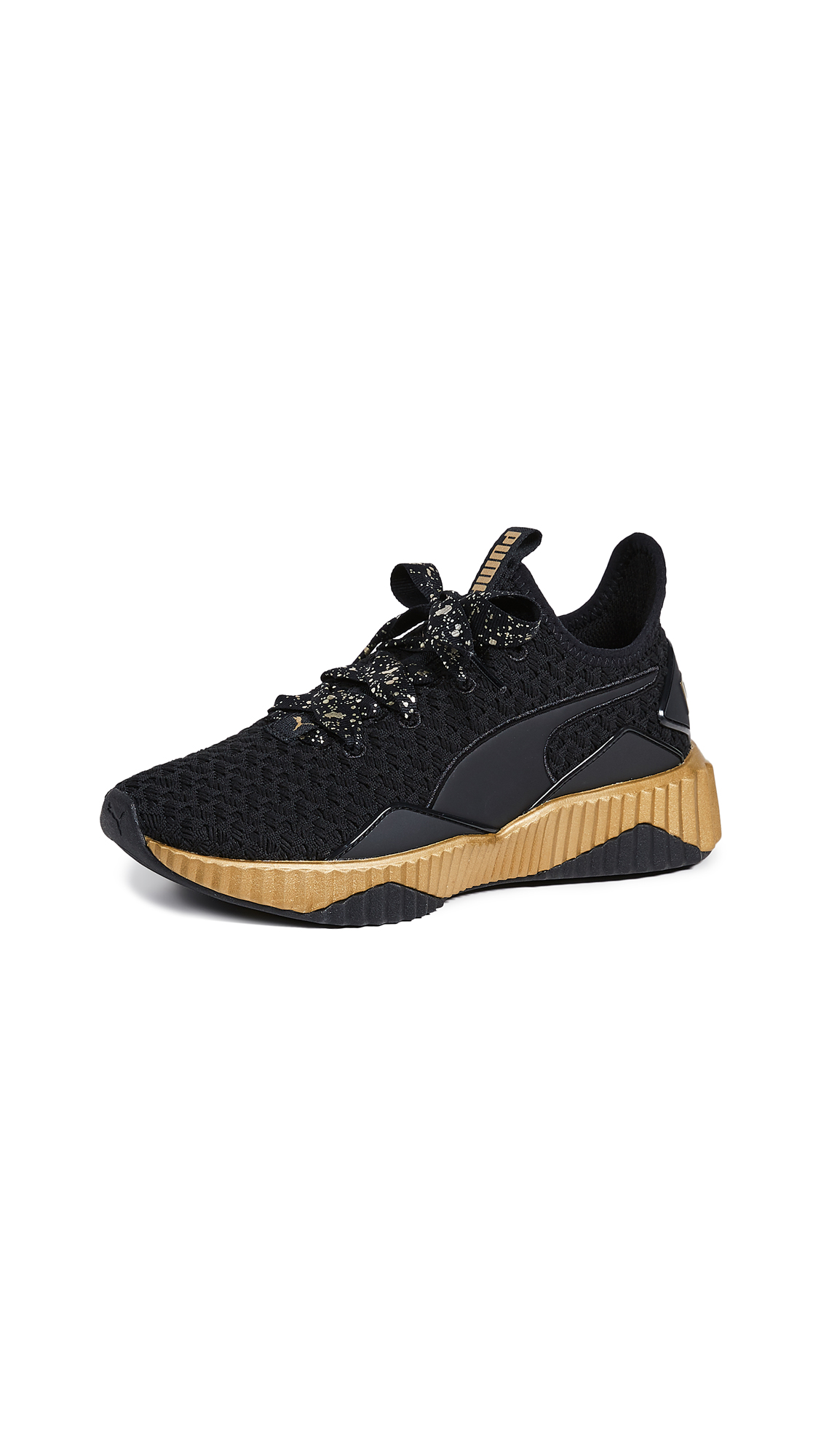 Puma Defy Sparkle Sneakers In Black/ Team Gold | ModeSens