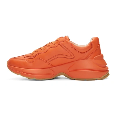 Shop Gucci Orange Logo Rhyton Sneakers In 7519 Orange